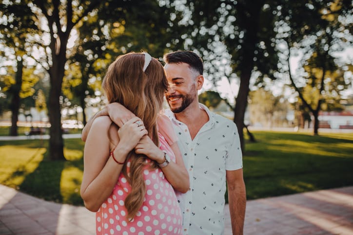 couple walking in the park in love