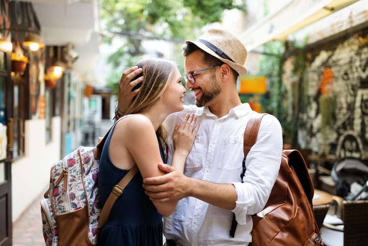 man and woman in the city enjoying themselves