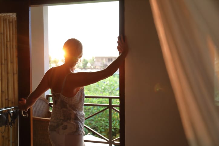 woman looking out of the window