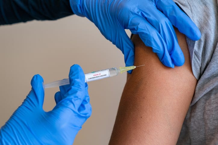 Covid-19 vaccine being administered.