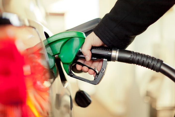 man holding gas pump