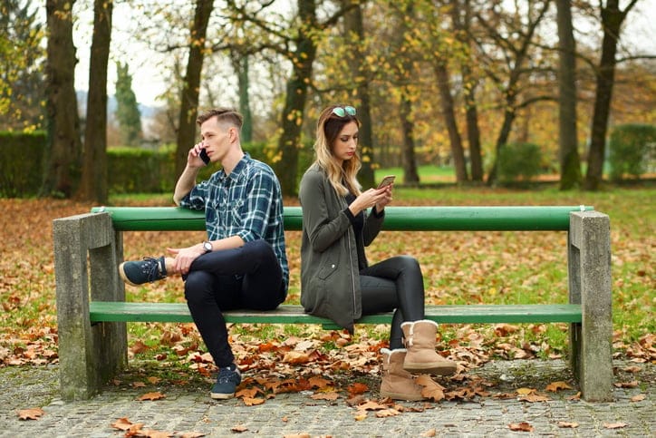 young couple having difficulties in the park