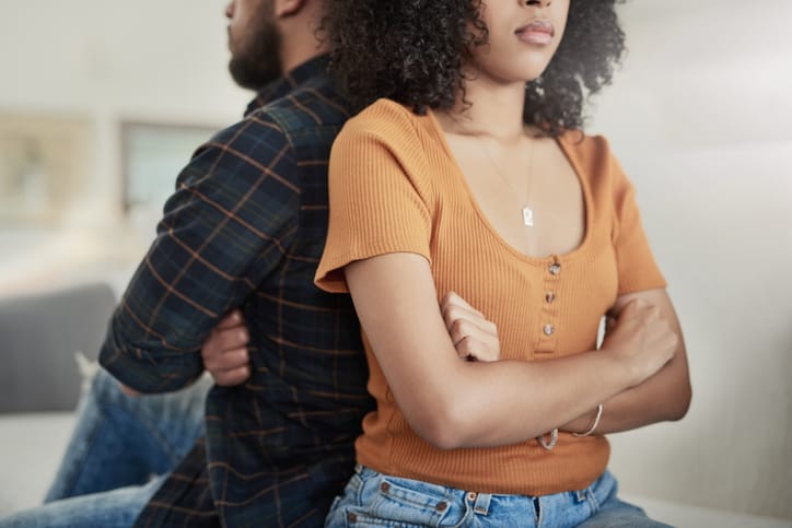 Shot of a young couple having a disagreement at home