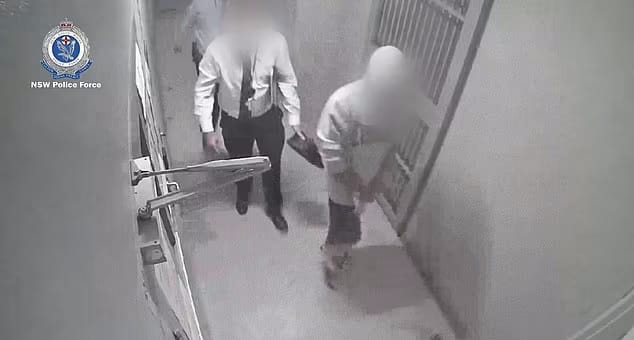 prisoner walking through prison