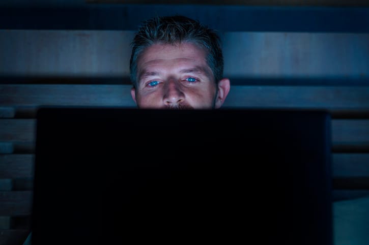 young guy on computer