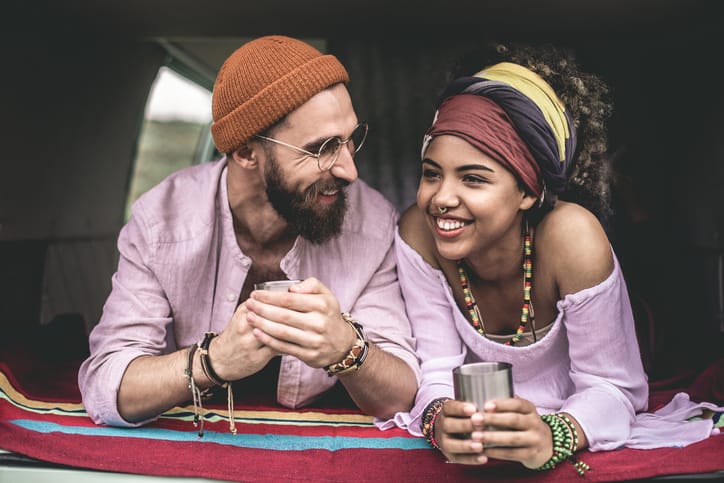 Young couple having a drink together.