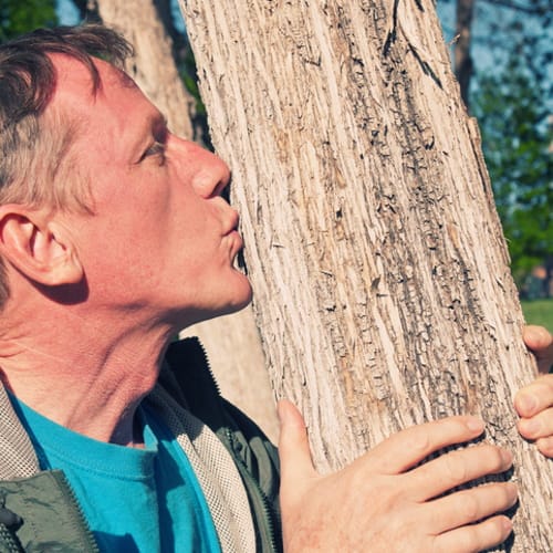 ecosexual man with tree