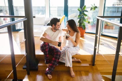 couple having a talk sitting on stoop