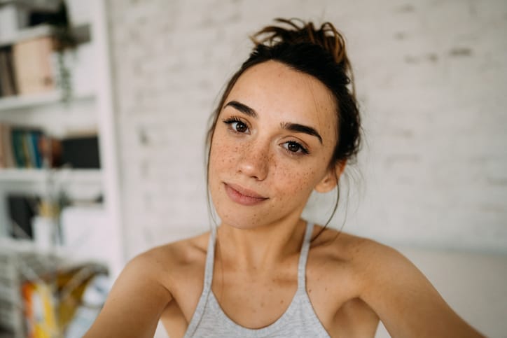 fresh faced young girl facing camera