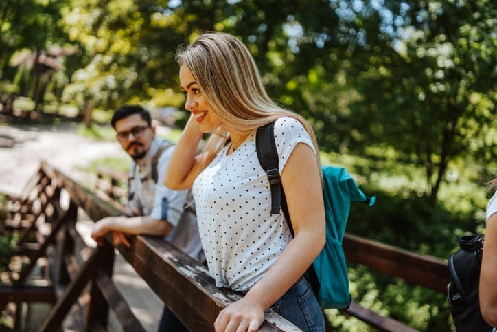signs a guy likes you as more than a friend