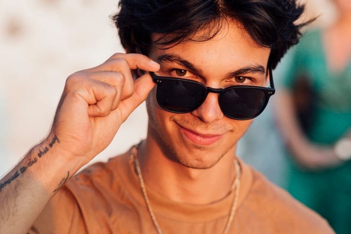 Man wearing black sunglasses.