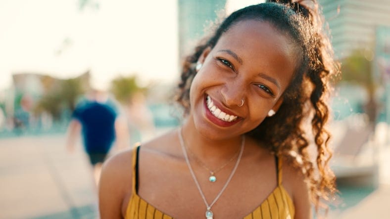 black woman smiling at camera