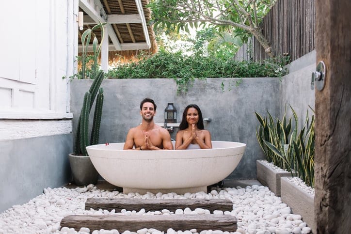 couple sitting in a bath