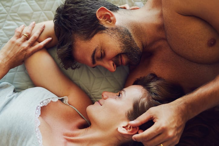 couple laying in bed together