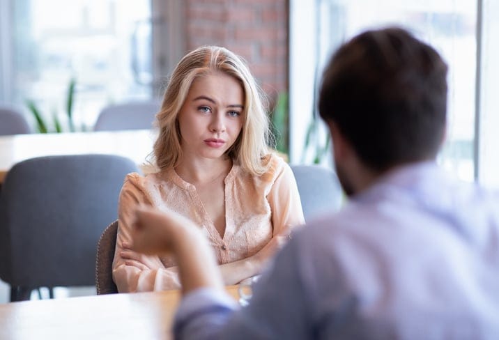 woman looking perplexed with a guy