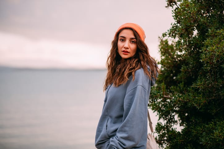 woman outside in beanie hat