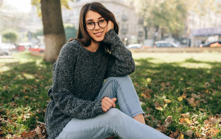 long haired brunette woman with glasses