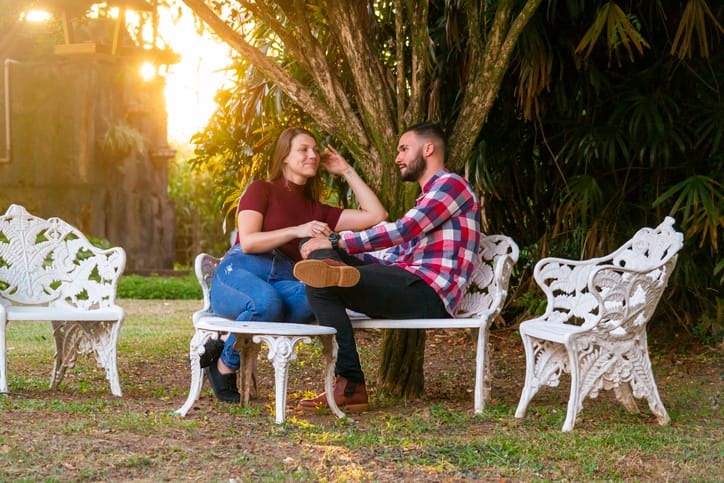 couple talking in sunset garden