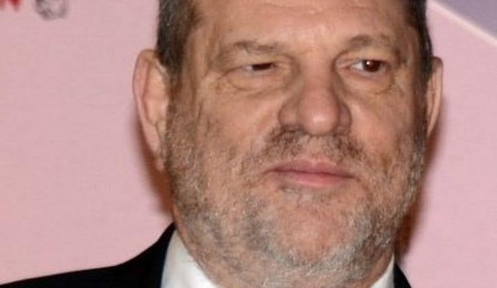 harvey weinstein smirking on red carpet