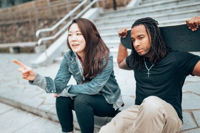 young couple flirting on stairs