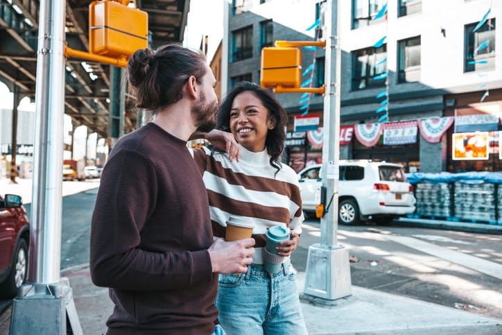 happy couple on city street