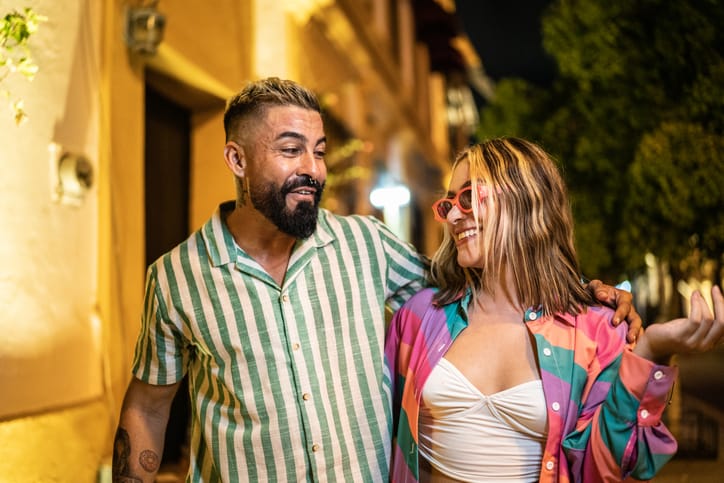 smiling latino couple on date night