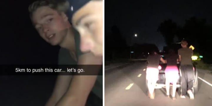 boys pushing car home