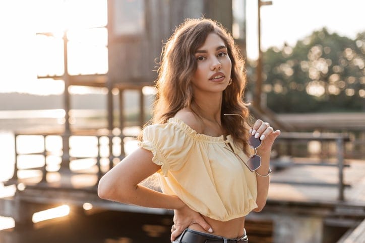 beautiful young woman outdoors sunset