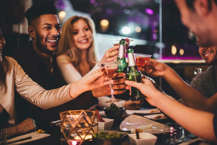 friends drinking at the bar