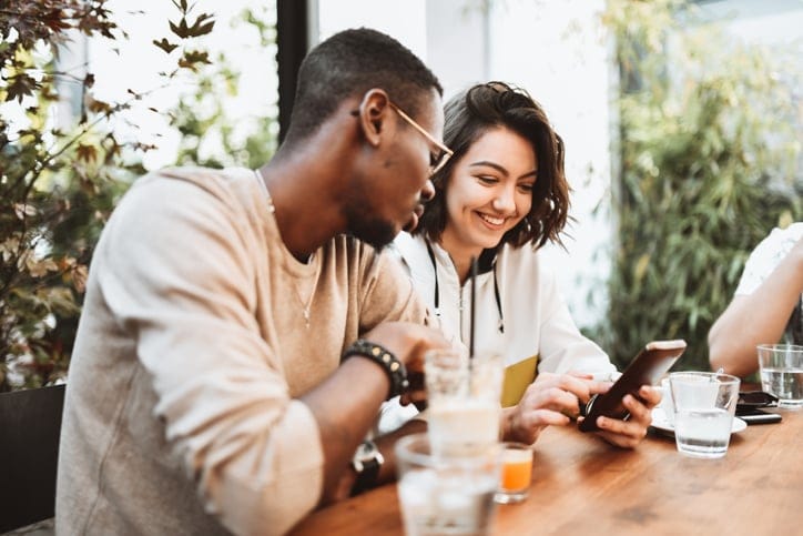 couple grabbing coffee at shop
