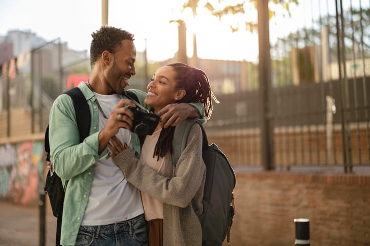 tourist couple embracing on vacation