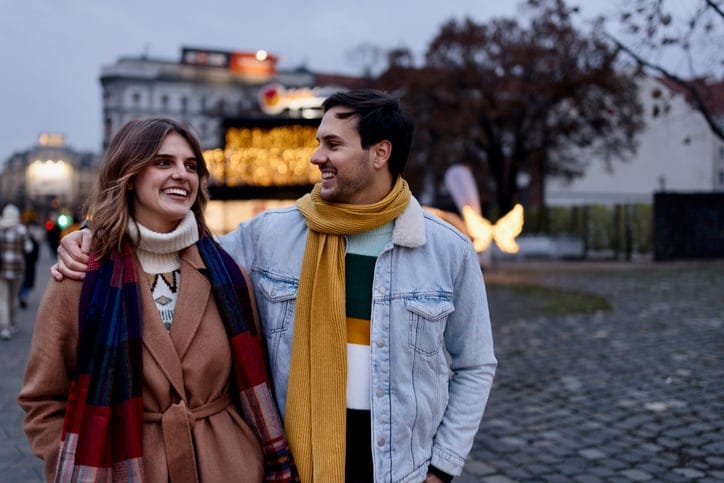 flirty couple on autumn walk