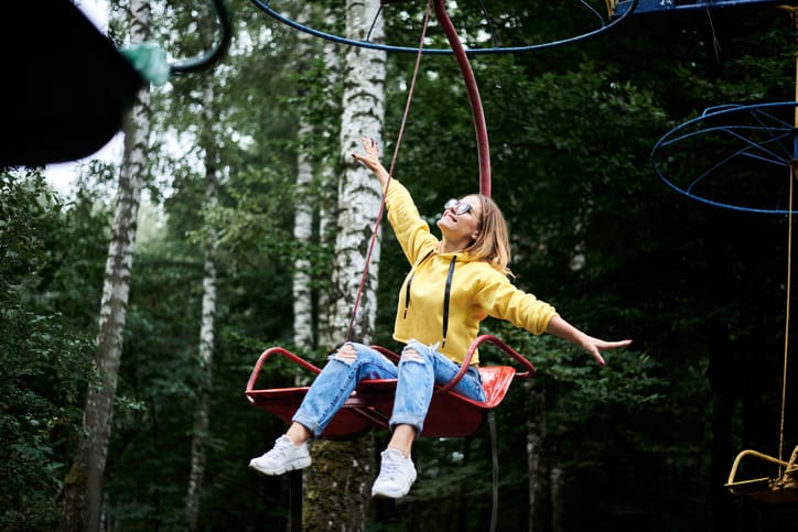 Young blond woman in amusement park