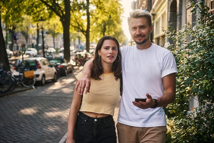 Shot of a young couple exploring the city of Amsterdam