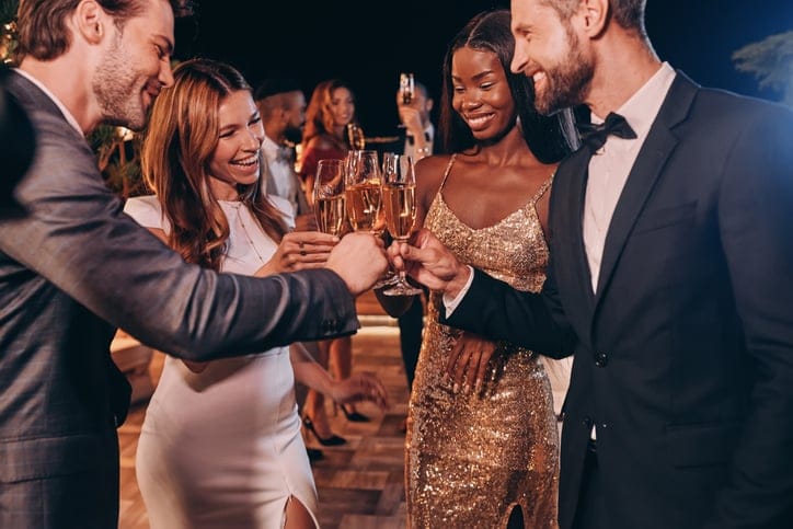Group of people toasting with champagne.
