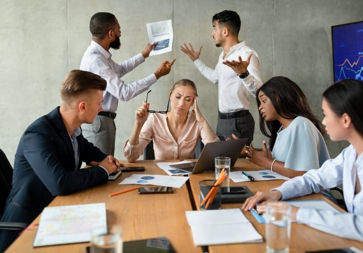 colleagues working in chaotic environment