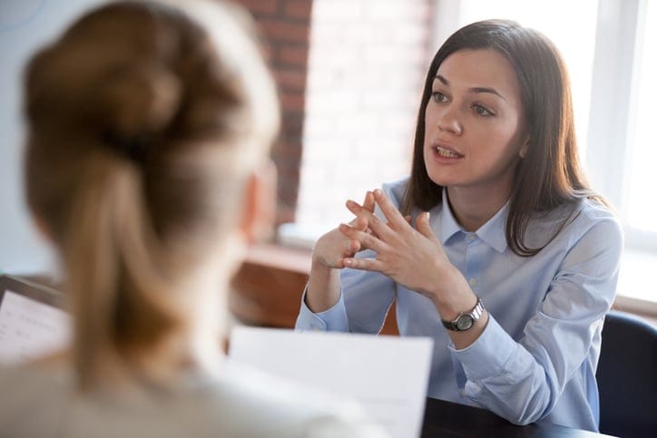 woman giving business presentation