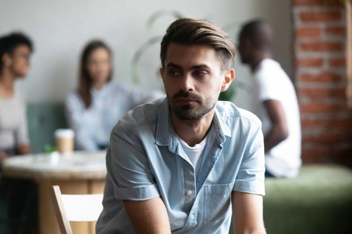 Man afraid to show his emotions.