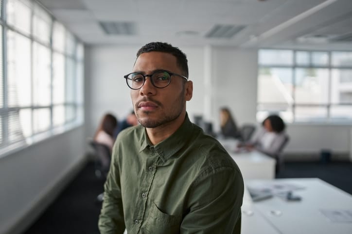 serious man sitting in office