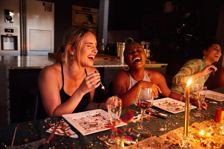 Two friends laughing.