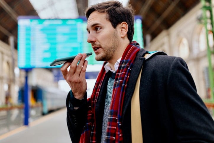Man sending voice message.