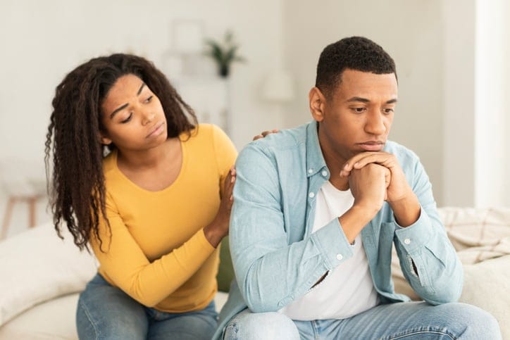 sad couple argue