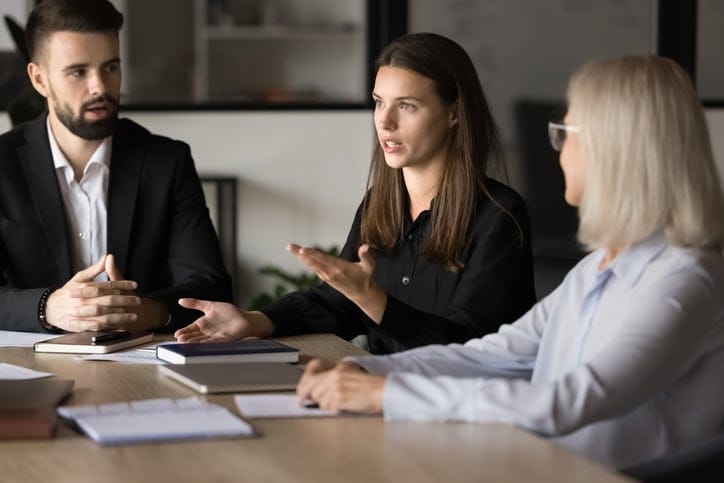 Woman giving a presentation at work.