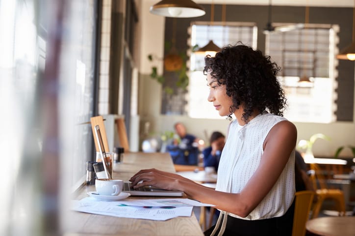 woman concentrating on work on laptop