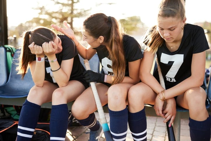 High school field hockey players.
