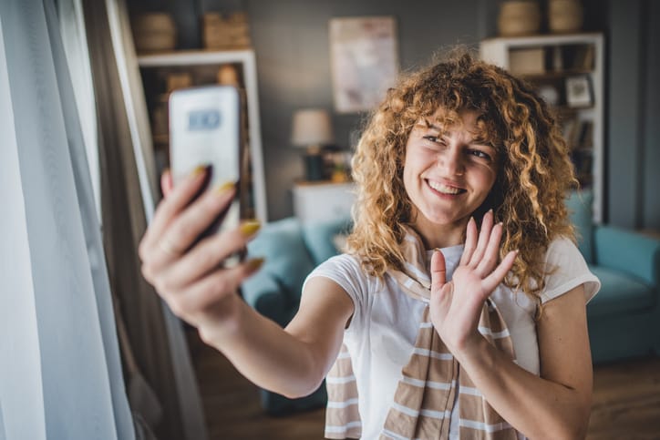 Young woman talking on a video call.