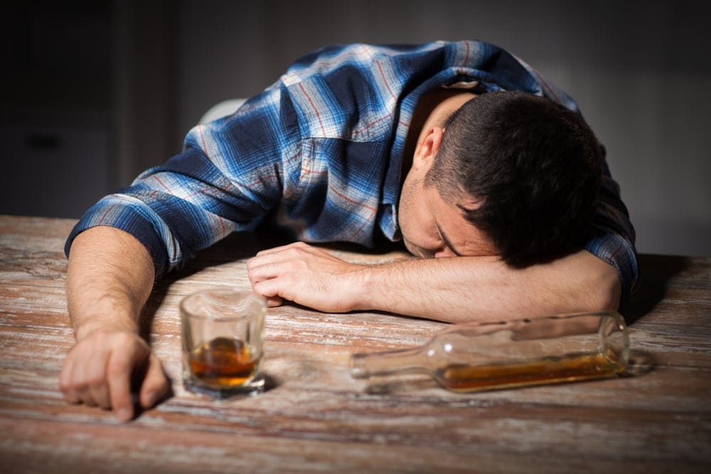 Man drinking alone.