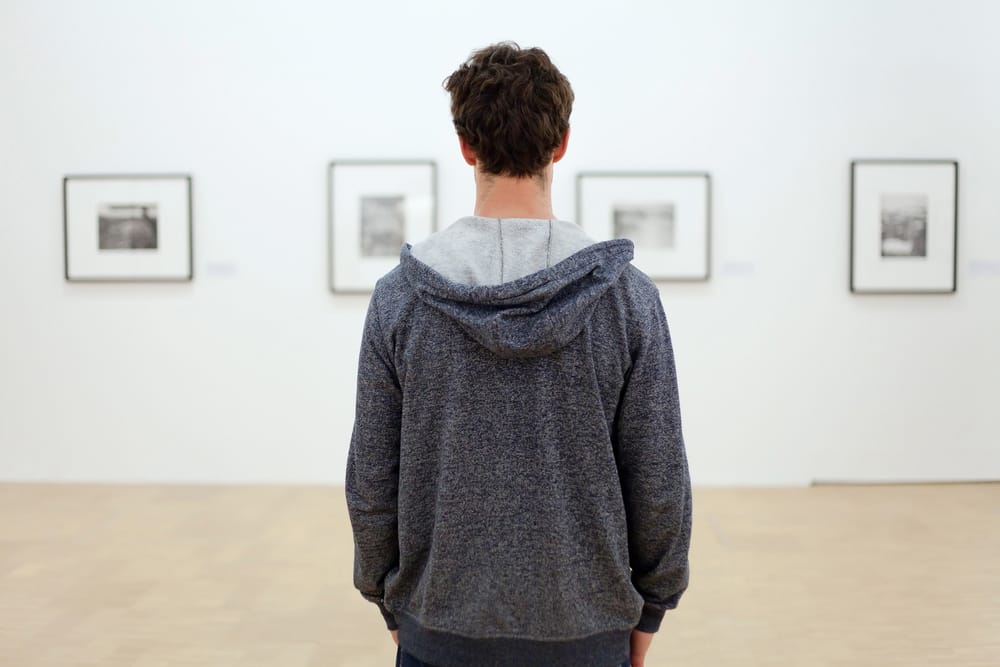 Man at a museum alone.