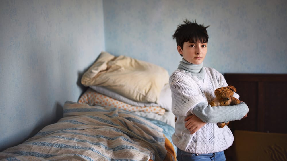 Young girl living in poverty.