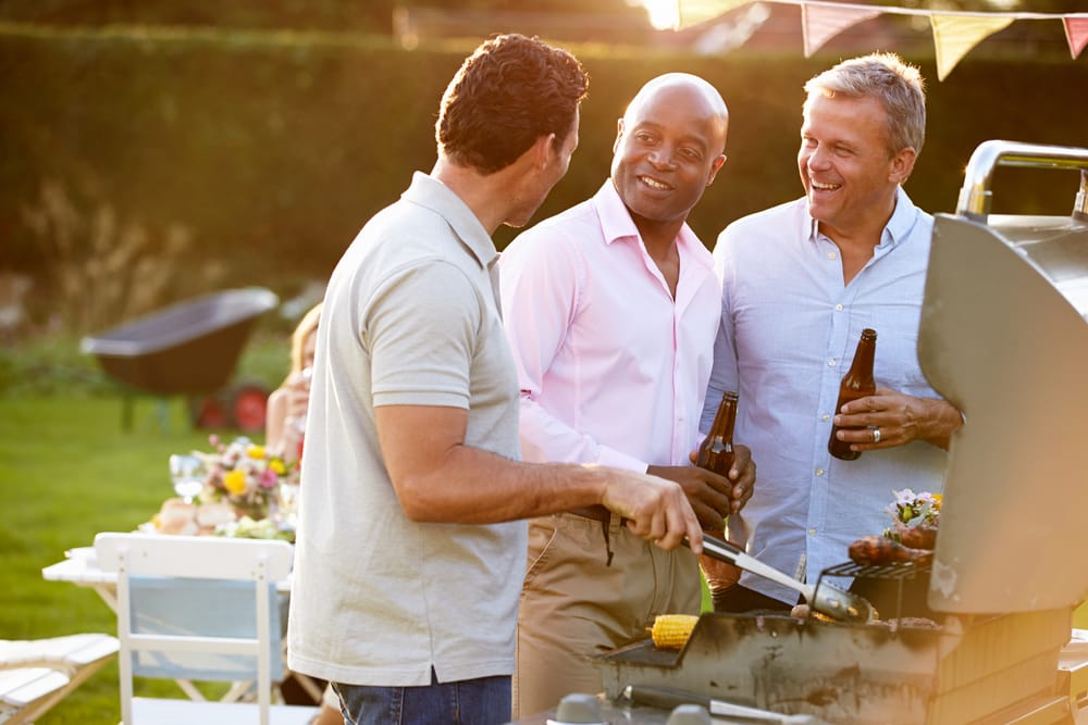Group of male friends catching up.